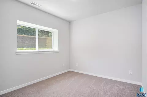 Bedroom - 1127 Cyber Ct, Madison, SD 57042 photo 7 of 8