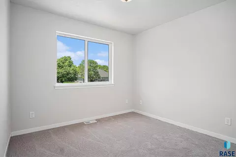 Bedroom - 1127 Cyber Ct, Madison, SD 57042 photo 5 of 8