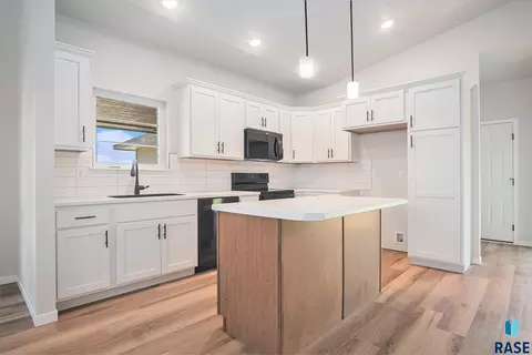 Kitchen - 1127 Cyber Ct, Madison, SD 57042 photo 1 of 2