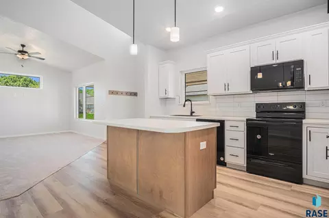 Kitchen - 1127 Cyber Ct, Madison, SD 57042 photo 2 of 2