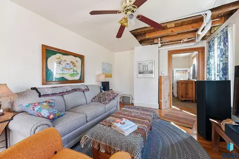 Living - 306 E 7th St, Dell Rapids, SD 57022 photo 2 of 3