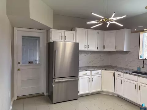 Kitchen - 211 E 3rd St, Egan, SD 57024 photo 2 of 6