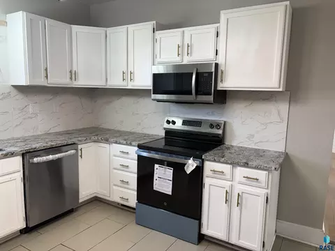 Kitchen - 211 E 3rd St, Egan, SD 57024 photo 5 of 6
