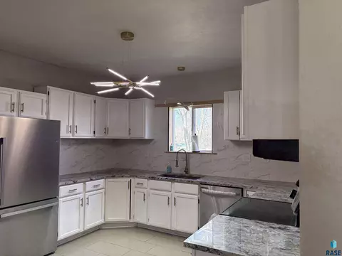 Kitchen - 211 E 3rd St, Egan, SD 57024 photo 3 of 6