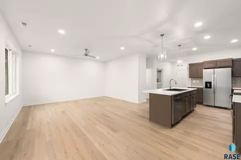 Living - 7240 E Waters Edge Pl, Sioux Falls, SD 57110 photo 2 of 3