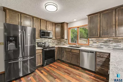 Kitchen - 912 NE 9th St, Madison, SD 57042 photo 3 of 4