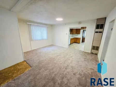 Living - 607 NE 4th St, Madison, SD 57042 photo 3 of 4