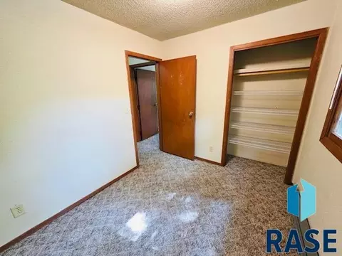 Bedroom - 607 NE 4th St, Madison, SD 57042 photo 2 of 4