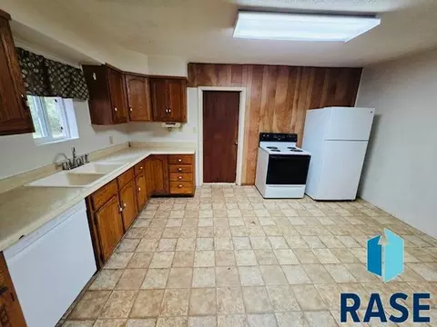 Kitchen - 607 NE 4th St, Madison, SD 57042 photo 2 of 3