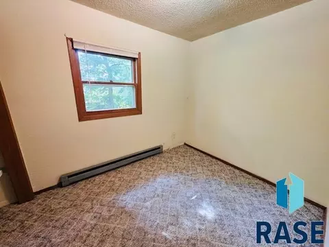 Bedroom - 607 NE 4th St, Madison, SD 57042 photo 1 of 4