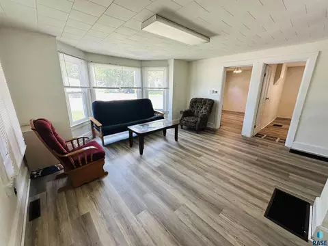 Living - 109 NE 4th St, Madison, SD 57042 photo 2 of 2