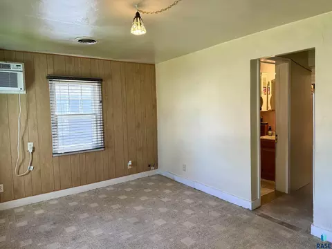 Living - 1031 E 1st Ave, Mitchell, SD 57301 photo 1 of 2