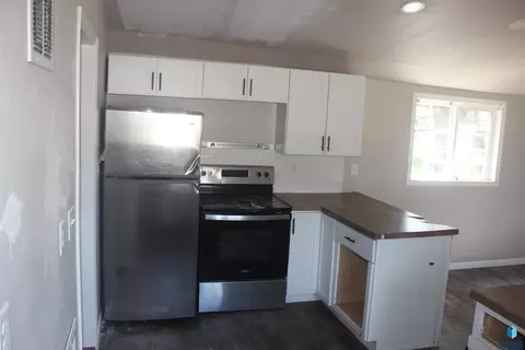 Kitchen - 1011 E 13th St, Yankton, SD 57078 photo 1 of 2