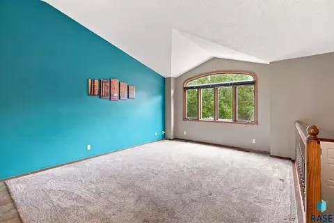 Living - 900 E Magnolia Dr, Brandon, SD 57005 photo 1 of 3