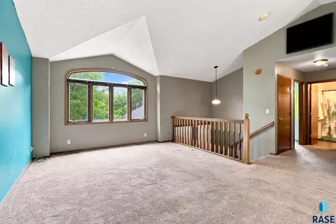 Living - 900 E Magnolia Dr, Brandon, SD 57005 photo 2 of 3