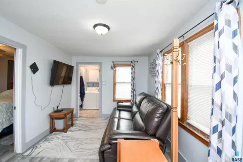 Living - 610 E 3rd St, Dell Rapids, SD 57022 photo 2 of 2