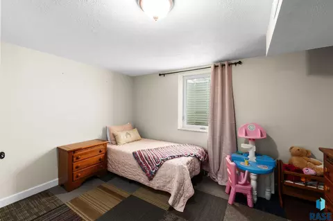 Bedroom - 313 S 4th Ave, Brandon, SD 57005 photo 6 of 7