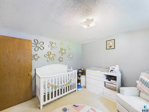 Bedroom - 721 NE 7th St, Madison, SD 57042 photo 5 of 8