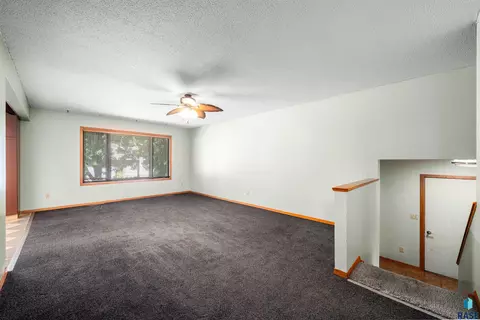 Living - 412 N Needles Dr, Brandon, SD 57005 photo 1 of 7