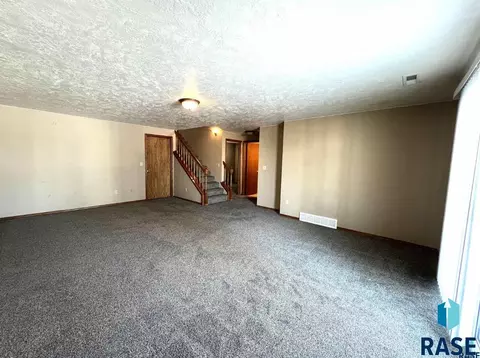 Living - 3100 E Bragstad Dr, Sioux Falls, SD 57103 photo 6 of 7