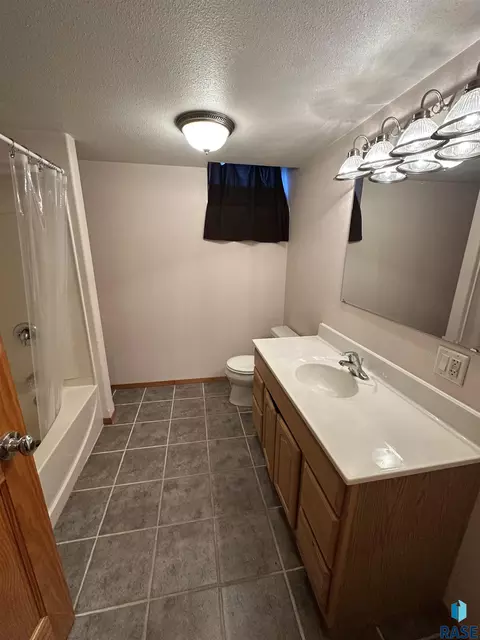 Bath - 214 E Park Ave, Howard, SD 57349 photo 1 of 2