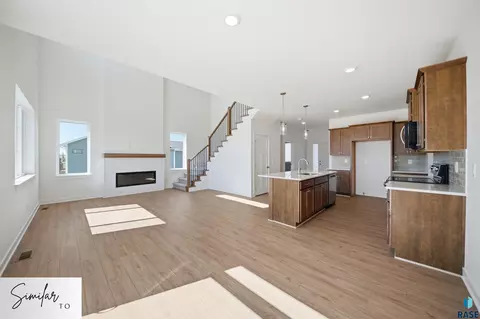 Living - 405 S Willow Spring Dr, Sioux Falls, SD 57110 photo 2 of 3