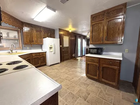 Kitchen - 521 W 2nd Ave, Miller, SD 57362 photo 5 of 6