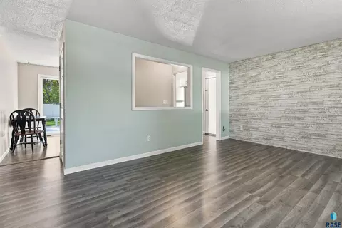 Living - 105 E Maureen Dr, Brandon, SD 57005 photo 2 of 5