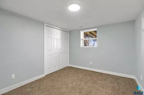 Bedroom - 105 E 3rd St, Dell Rapids, SD 57022 photo 2 of 3