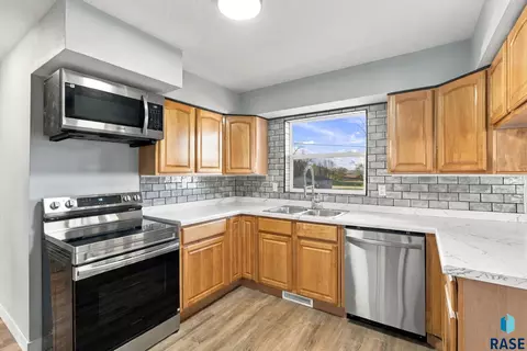 Kitchen - 105 E 3rd St, Dell Rapids, SD 57022 photo 2 of 2