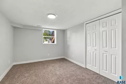 Bedroom - 105 E 3rd St, Dell Rapids, SD 57022 photo 3 of 3