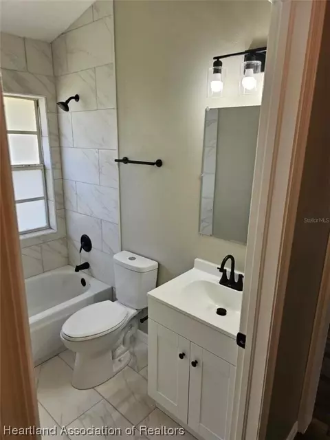 203 Vanwall Ter, Sebring, FL 33872 photo 6