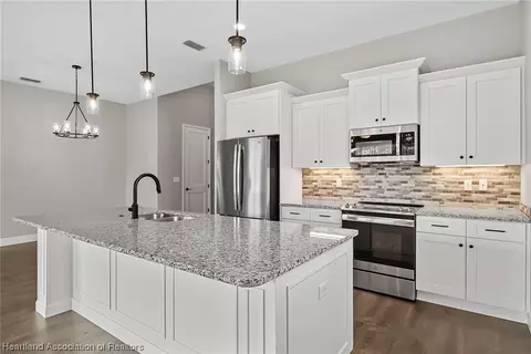 5297 Pebble Beach Dr, Sebring, FL 33872 photo 3