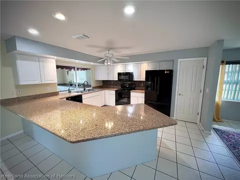 Kitchen - 4515 Duffer Loop, Sebring, FL 33872 photo 2 of 2