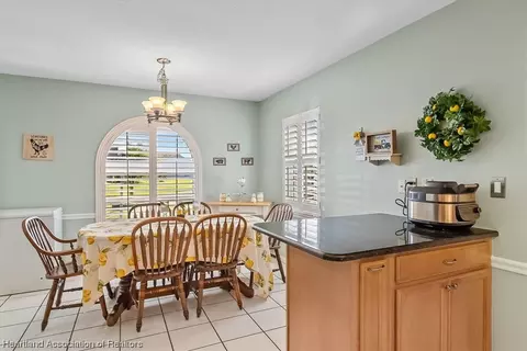 Kitchen - 1613 Willow Run, Sebring, FL 33872 photo 2 of 3