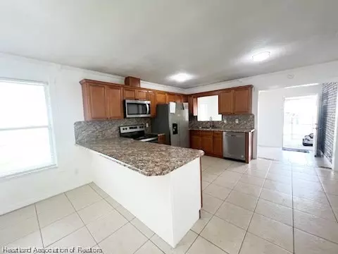 Kitchen - 4130 Elson Ave, Sebring, FL 33875 photo 5 of 6