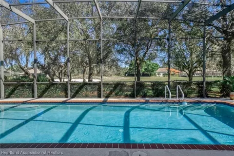 Exterior - 3875 Enchanted Oaks Ln, Sebring, FL 33875 photo 6 of 10