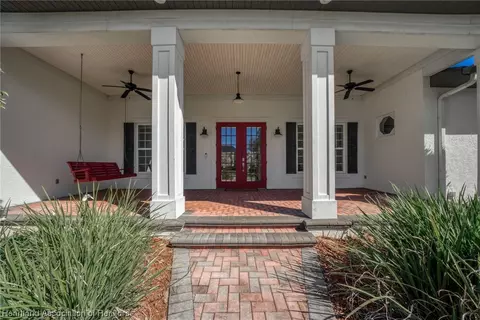 Exterior - 3875 Enchanted Oaks Ln, Sebring, FL 33875 photo 3 of 10