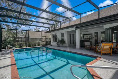 Exterior - 3875 Enchanted Oaks Ln, Sebring, FL 33875 photo 2 of 10