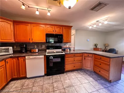 Kitchen - 4924 Cricket Dr, Sebring, FL 33876 photo 1 of 7