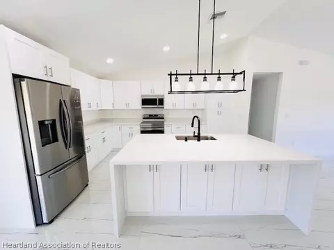 Kitchen - 459 Thiseldo Ln, Sebring, FL 33875 photo 5 of 6