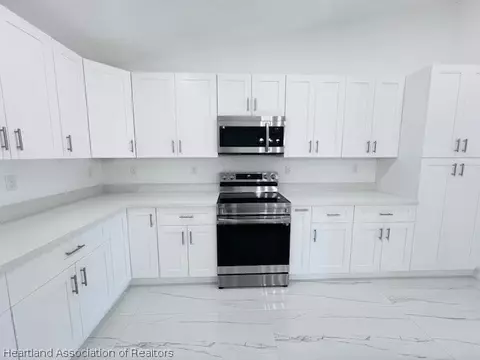 Kitchen - 459 Thiseldo Ln, Sebring, FL 33875 photo 6 of 6