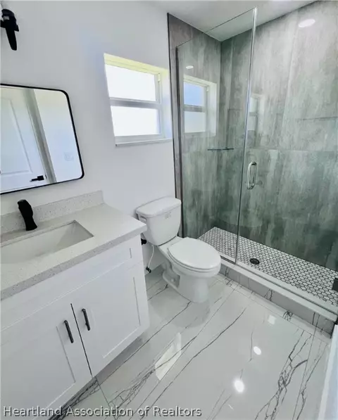 Bath - 459 Thiseldo Ln, Sebring, FL 33875 photo 5 of 7