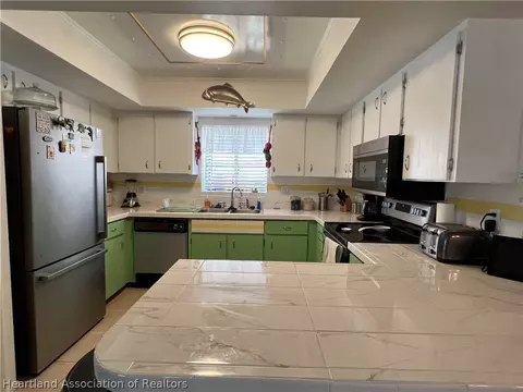 Kitchen - 4111 Thompson Ave, Sebring, FL 33875 photo 1 of 2