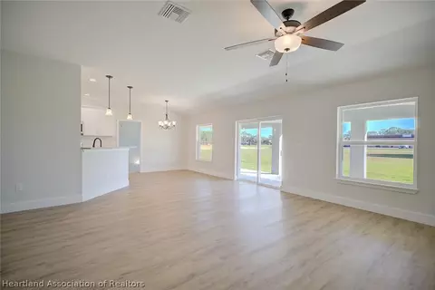 Living - 1917 Iris Ave, Sebring, FL 33875 photo 1 of 2