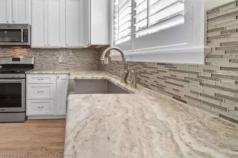 Kitchen - 308 Maple Ln, Sebring, FL 33876 photo 2 of 4