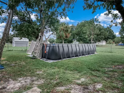 Exterior - 600 Cherry Tree Dr, Sebring, FL 33876 photo 6 of 10