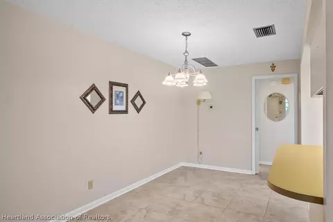 Dining - 4520 Leucadendra Dr, Sebring, FL 33872 photo 2 of 2
