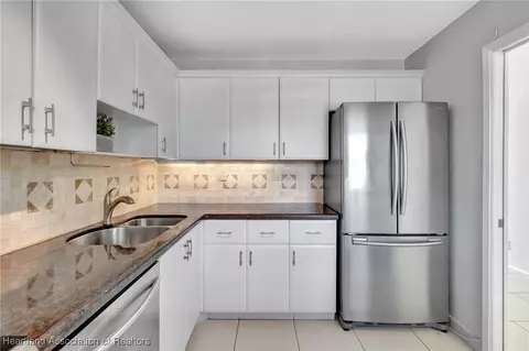 Kitchen - 3100 N Course Ln, Pompano Beach, FL 33069 photo 2 of 4