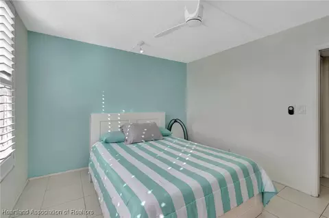 Bedroom - 3100 N Course Ln, Pompano Beach, FL 33069 photo 5 of 6